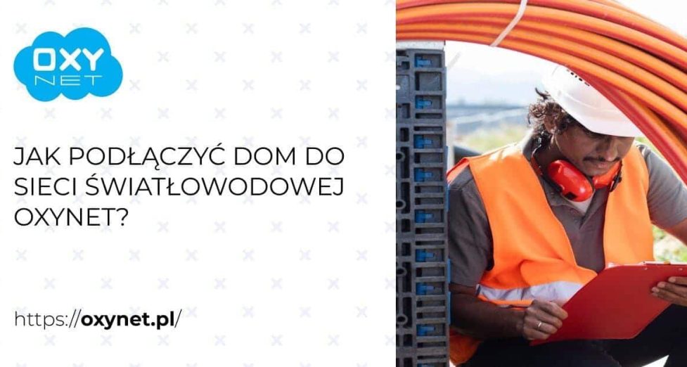 Przemysłowiec przy instalacji światłowodowej, montaż kabli w terenie, technologia światłowodowa, instalacja światłowodowa, prace budowlane na zewnątrz, firma Oxynet Jarosław.